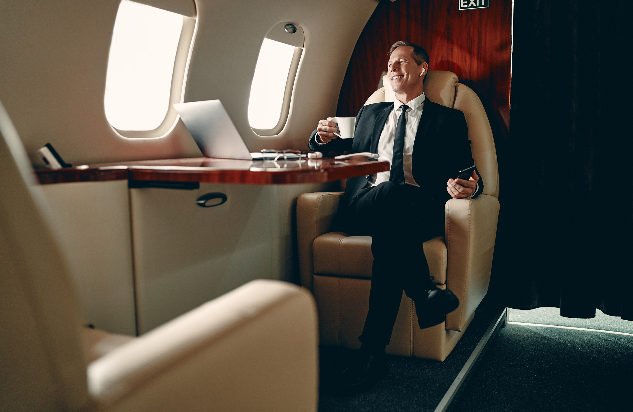 Businessman in private jet charter