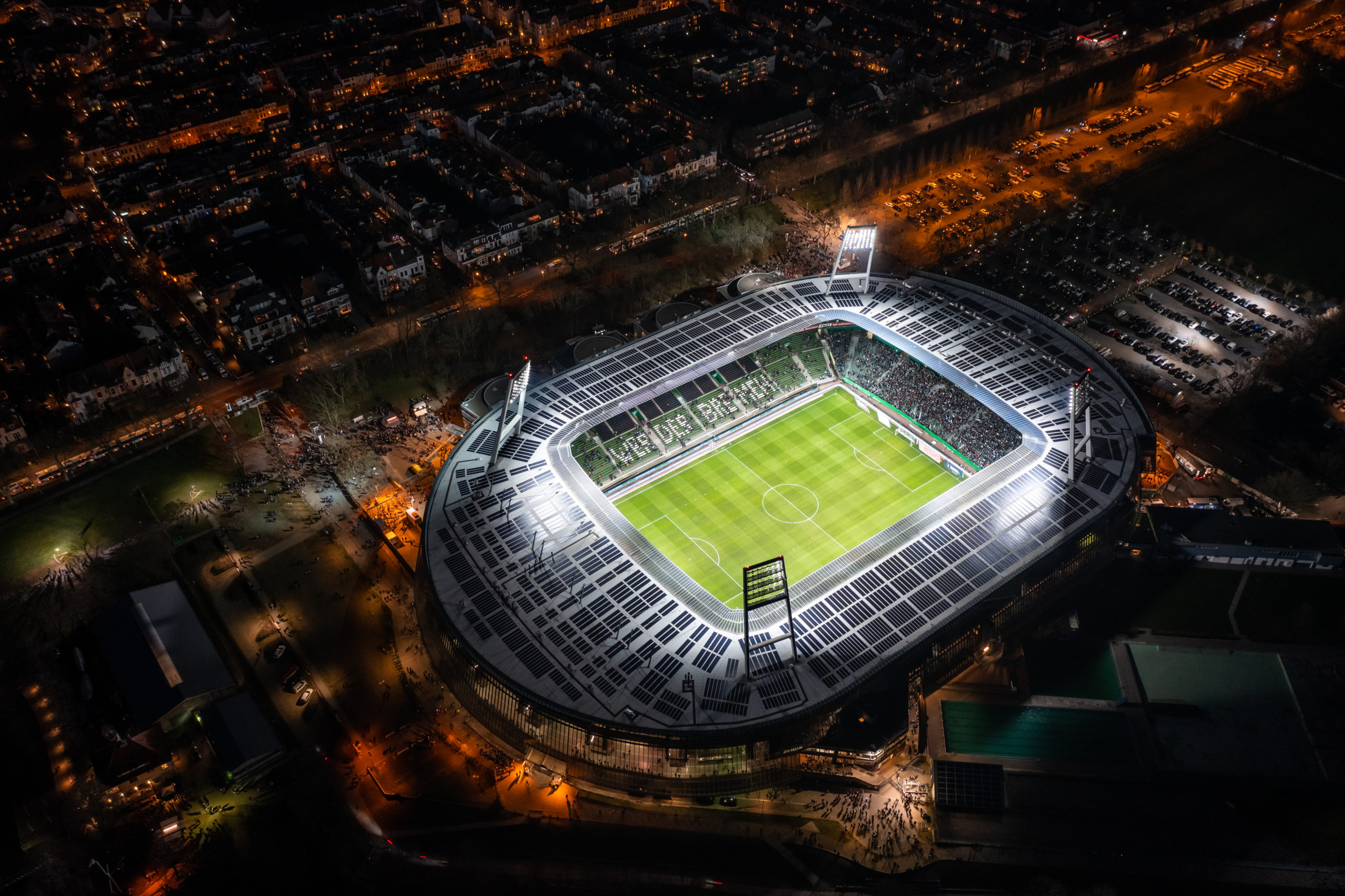 Night aerial view on the illuminated Weserstadion in Bremen
