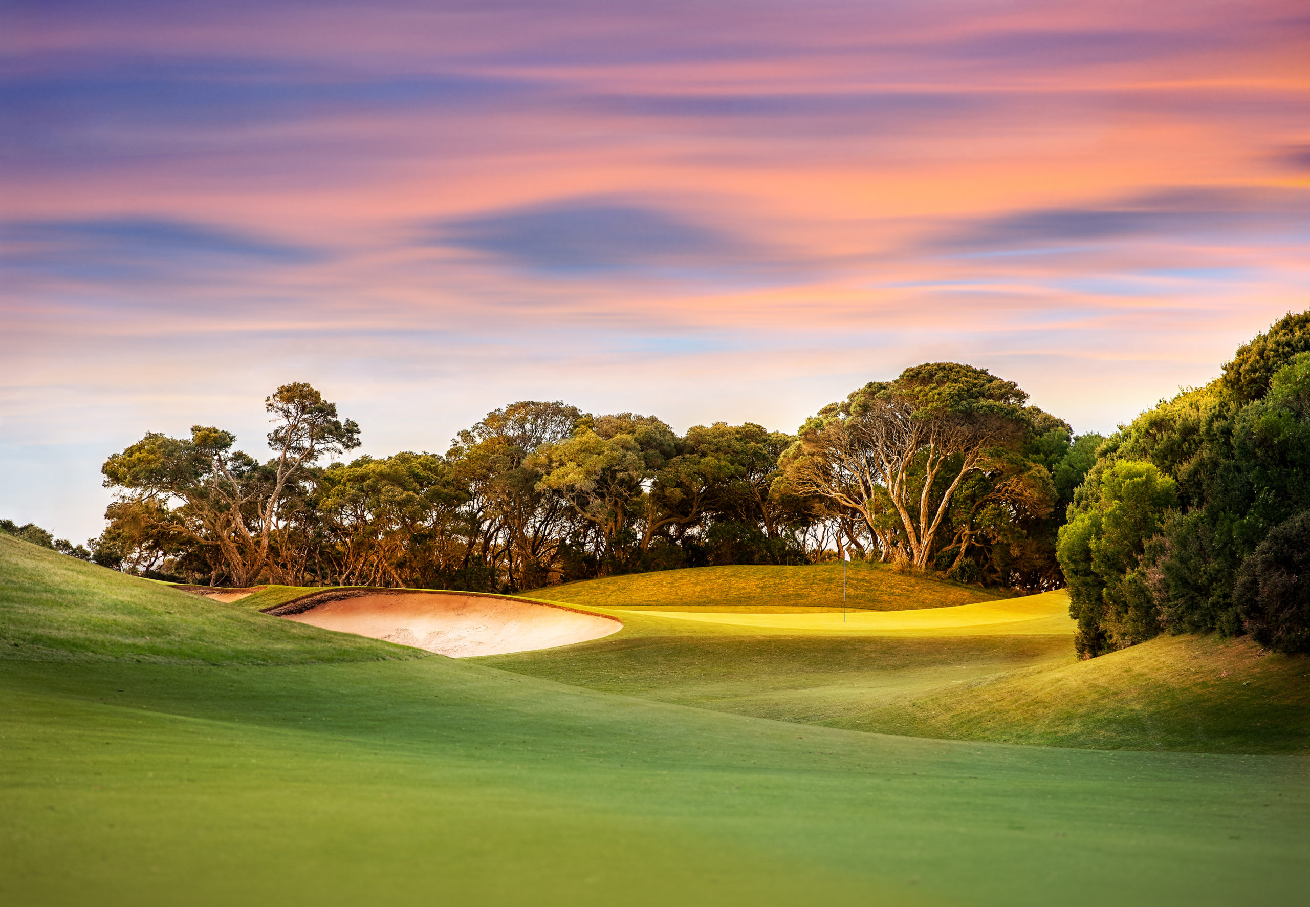 Golf Course at Sunset with light on the green